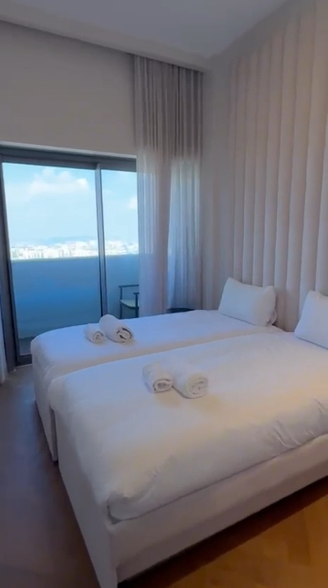 Bedroom four · private balcony; still from the apartment walkthrough